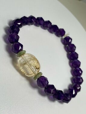 Vibrant Amethyst and Rutilated Citrine Focal Bead Stretch Bracelet.